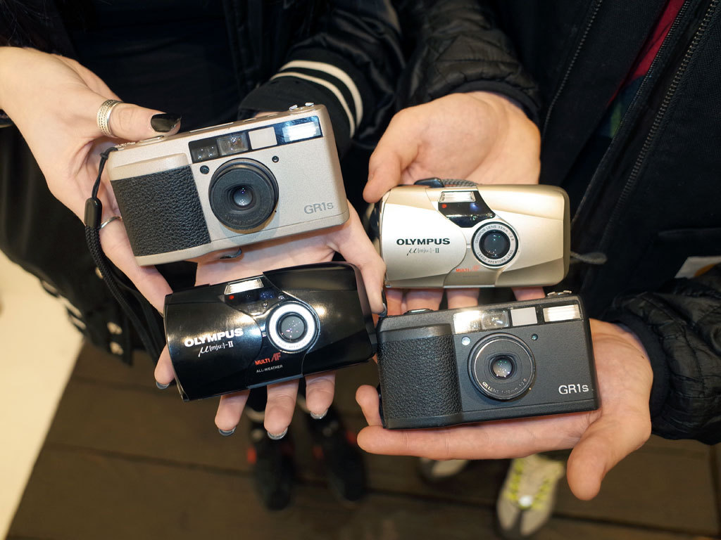 tokyo camera style — Totem Pole Photo Gallery, Shinjuku Left: Ricoh