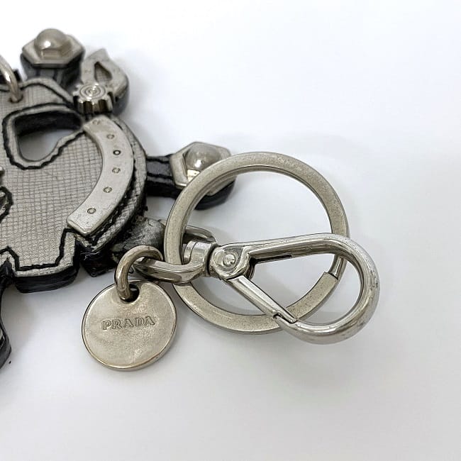 楽天市場】【送料無料】 プラダ チャーム シルバー ドクロ