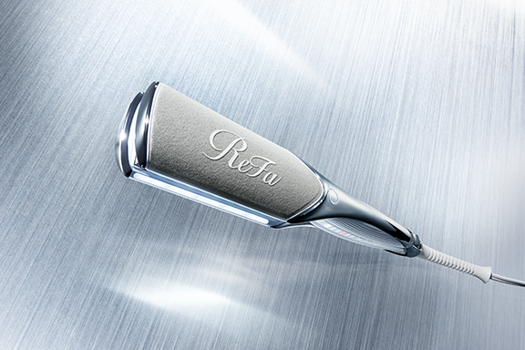 Smooth away frizz with just one stroke — Straight, shiny hair