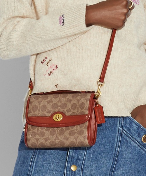 COACH（コーチ）の「キップ ターンロック クロスボディ シグネチャー