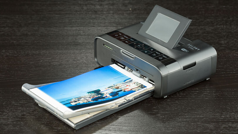 Canon Selphy CP1200 Wireless Compact Photo Printer Review | PCMag