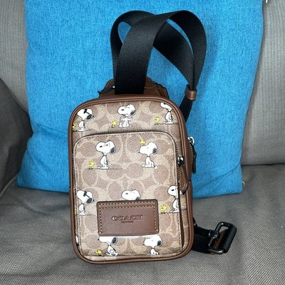Coach X Peanuts Racer Sling Pack In Signature Canvas With Snoopy