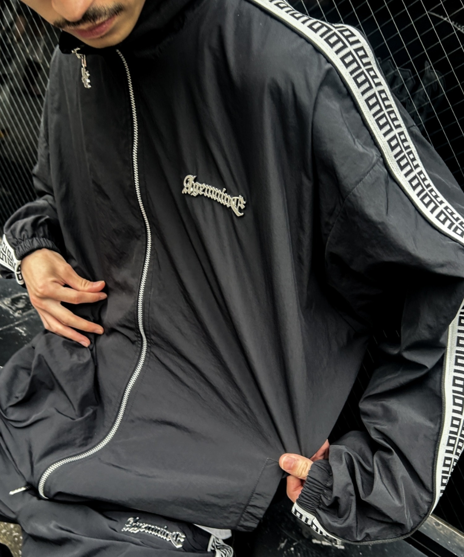 A'GEM/9 × .kom 『A'GEM/9/エージェムナイン』 ジャガードロゴナイロン