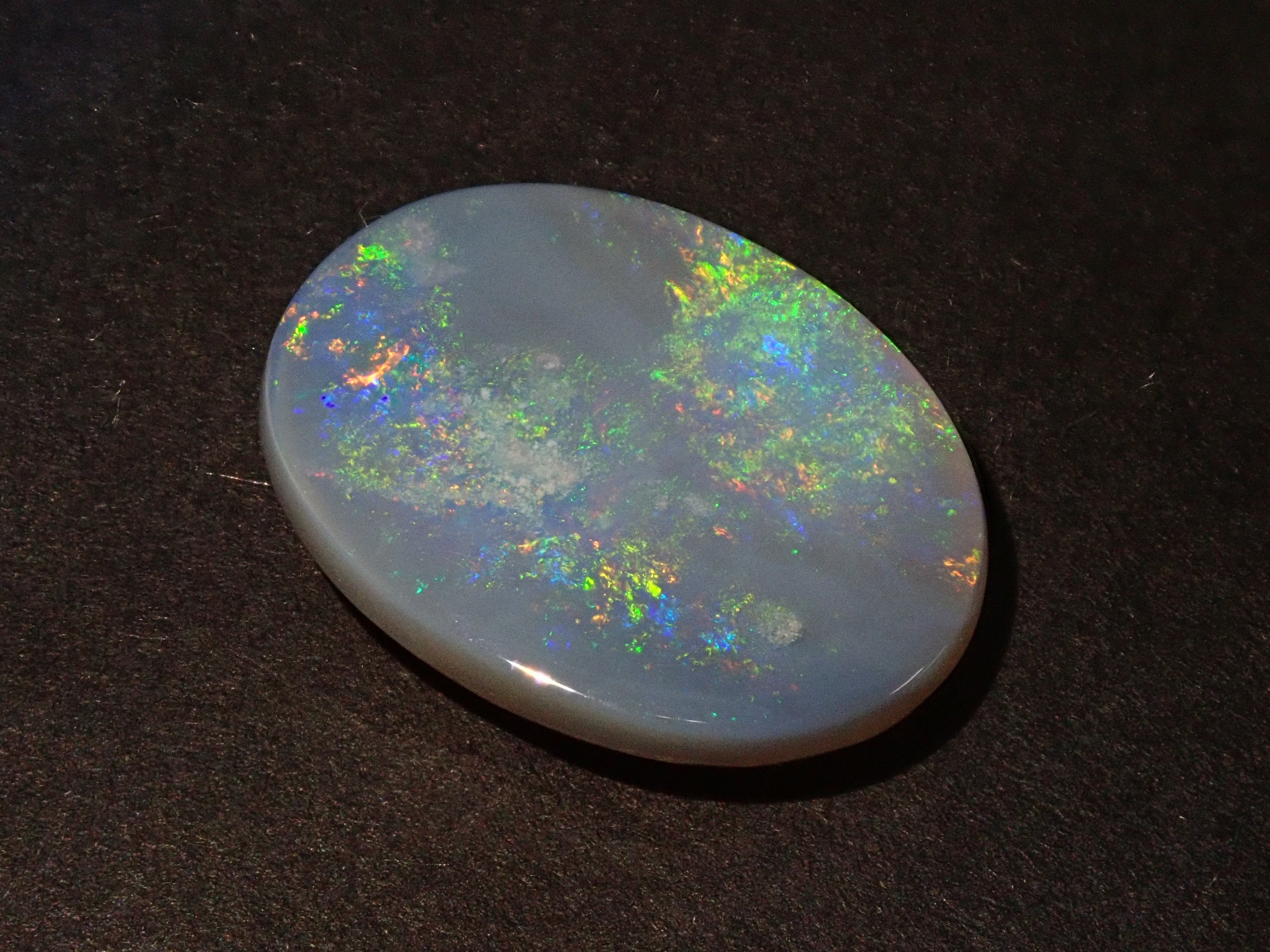 オーストラリア産ブラックオパール 6.560ctルース 鑑別書