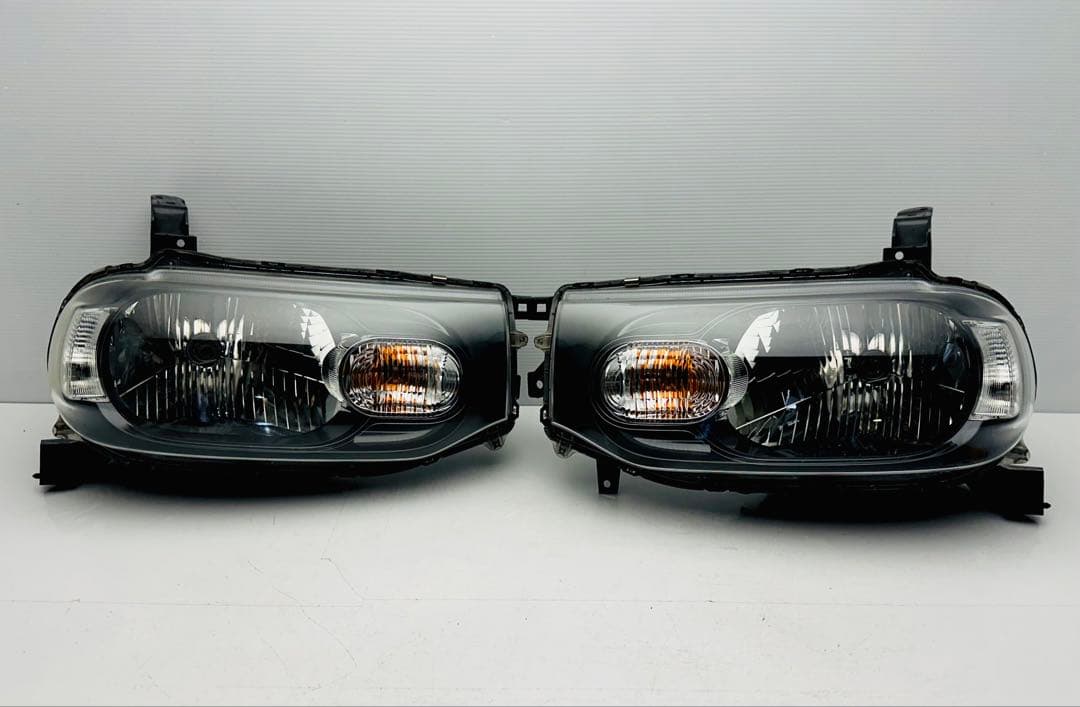 日産 キューブ ヘッドライト ヘッドランプ ハロゲン STANLEY P8190