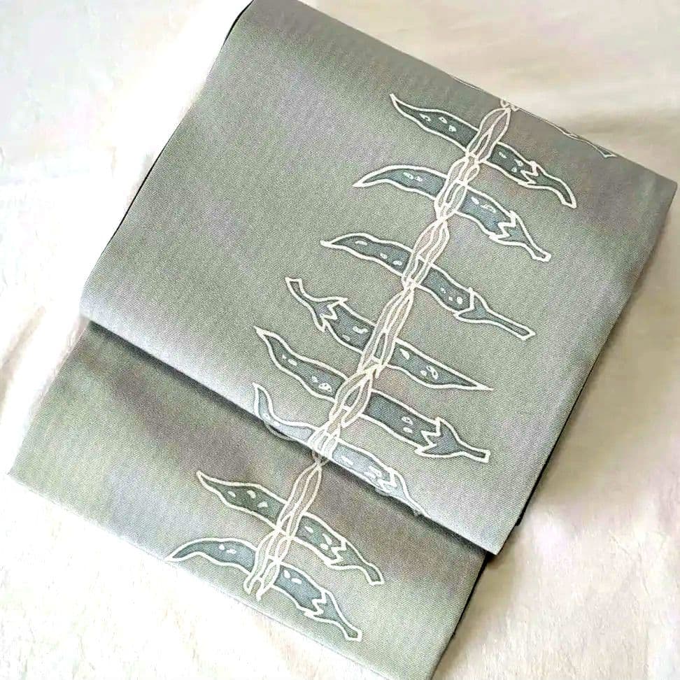 正絹　全通柄袋帯　型染　成物　唐辛子　魔除　大人の遊び心帯 袋帯 正絹 西陣織 六通柄 未使用 とみや織物謹製 仕立て付き 送料無料