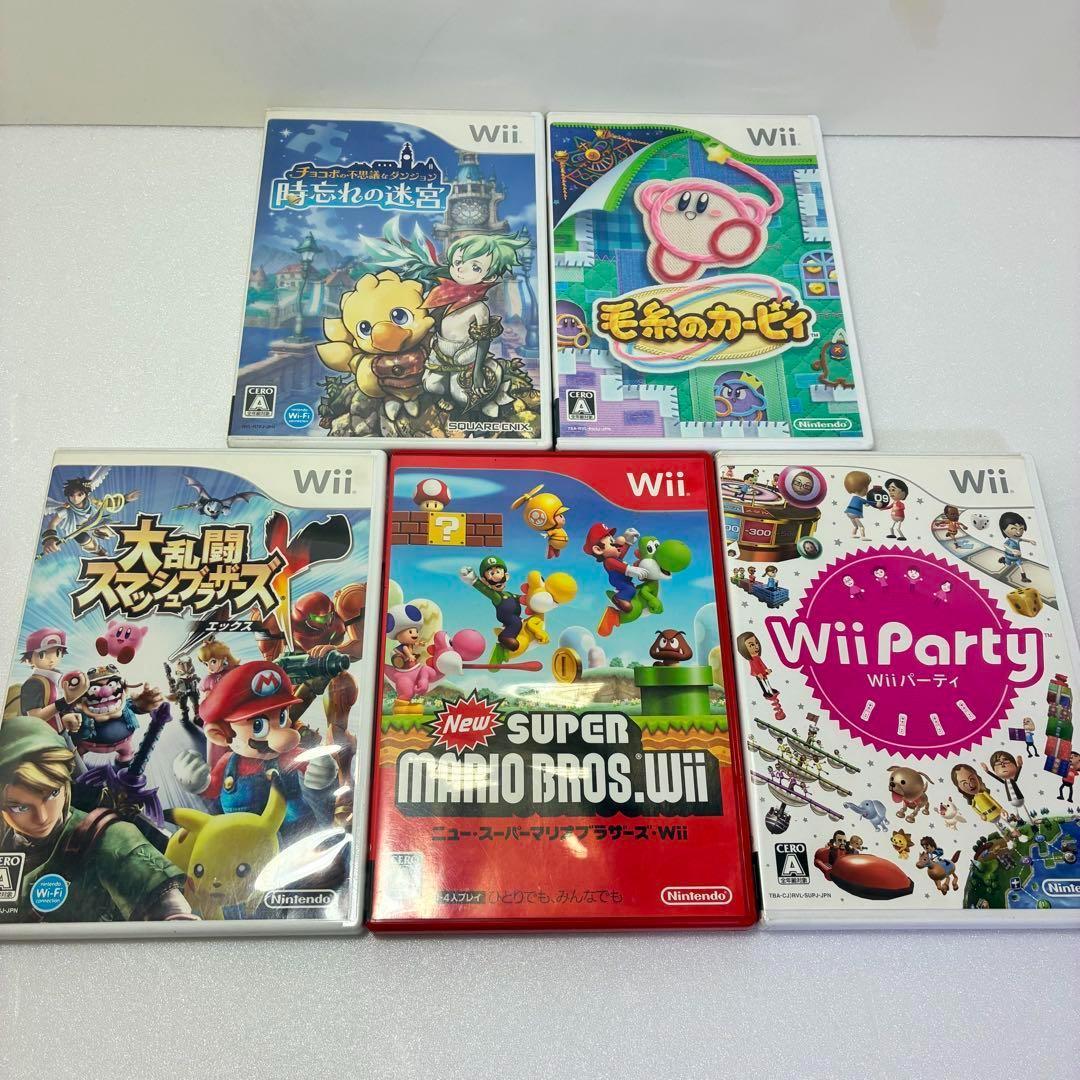 Wii本体 ＋ リモコン、コントローラー各2台 ＋ 充電器 ＋ ソフト9本