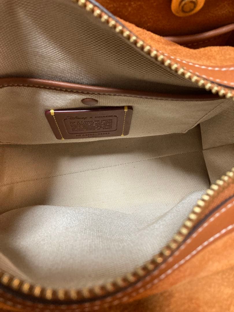 ご予約品【DISNEY×COACH】ディズニー50周年 ショルダーバッグ - メルカリ