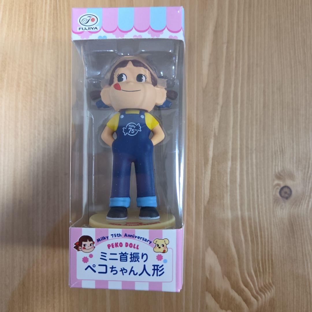 FUJIYA 75周年 ミニ首振りペコちゃん人形 - メルカリ