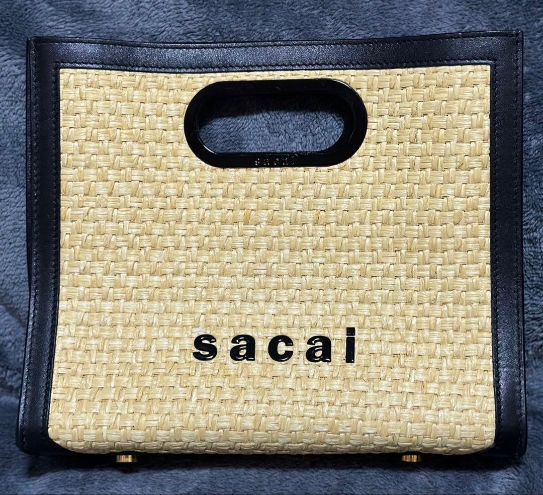 sacai サカイ ロゴ カゴミニバッグ ハンドバッグ 鞄 The pocket bag series, featuring sacai logo and big pockets, has
