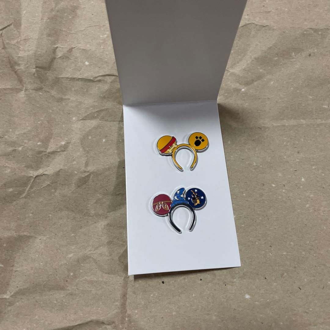 ディズニー リゾート ピンバッジ プルート シークレット - メルカリ