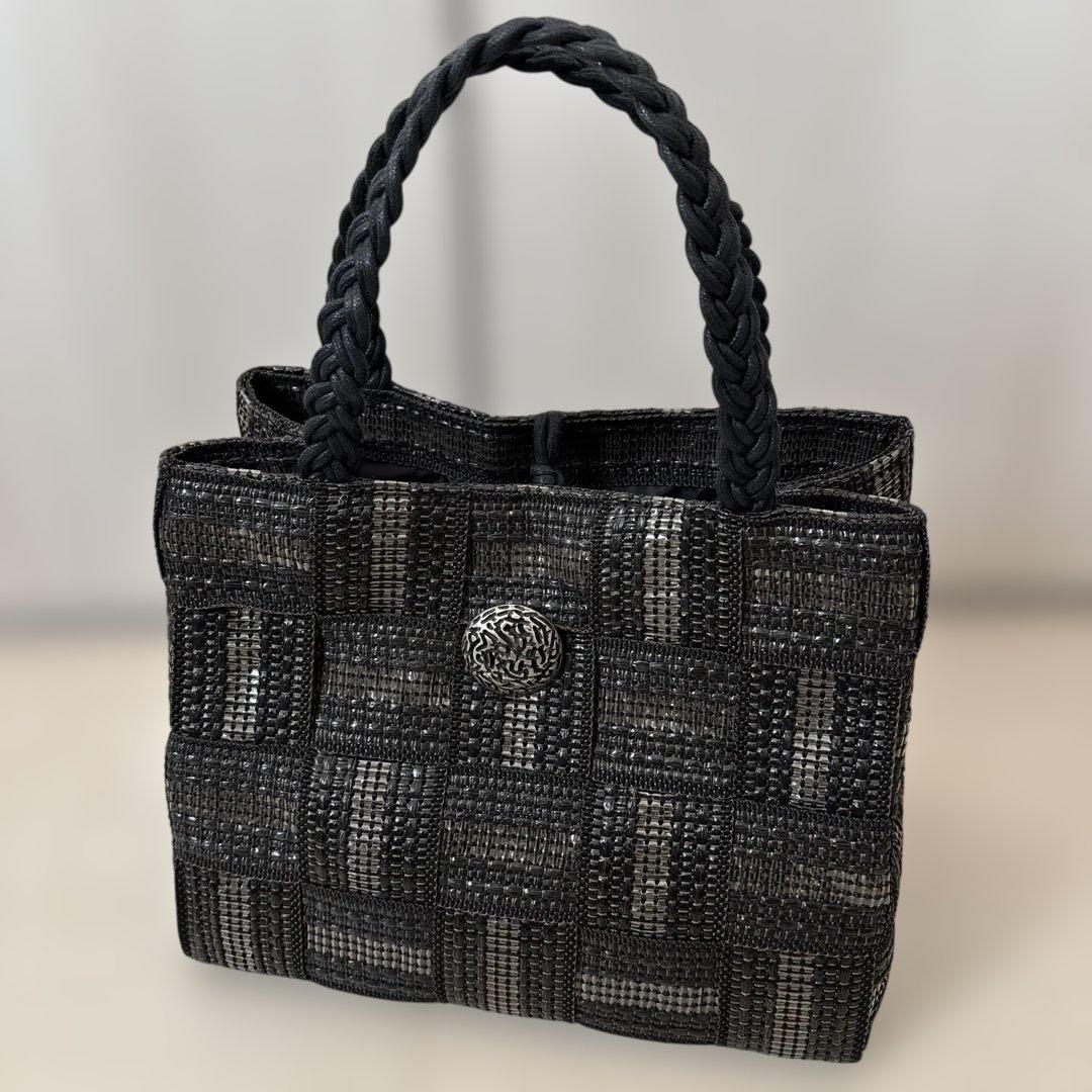 ALMA TONUTTI かごバッグ　三つ編みハンドル ブリザード メッゾ ALMA TONUTTI かごバッグ 三つ編みハンドル ブリザード メッゾ - メルカリ