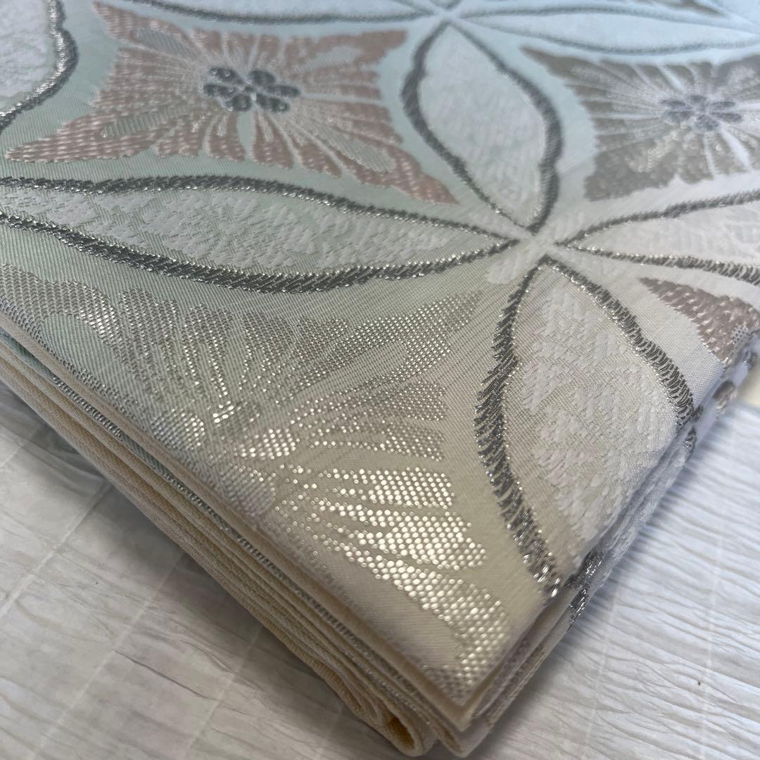 新品・未使用】 袋帯 正絹 西陣織 丸勇 七宝繋ぎ紋様 証紙あり - メルカリ