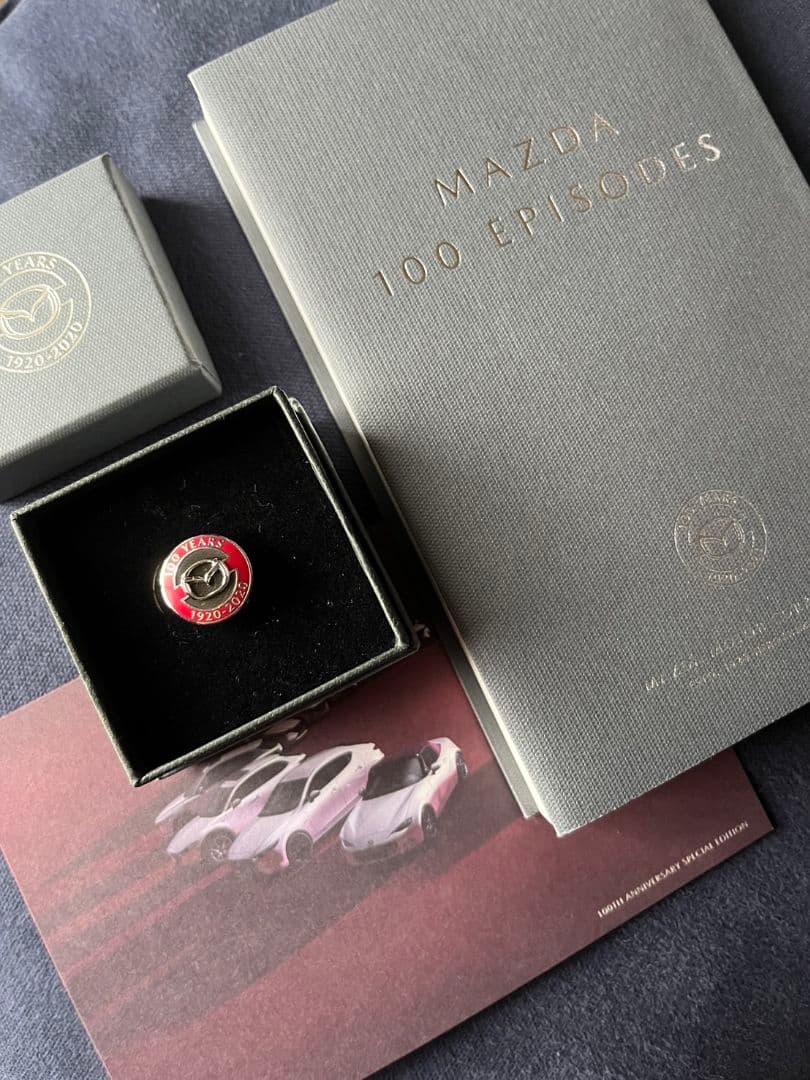 MAZDA マツダ 100周年記念バッチ(非売品) - メルカリ