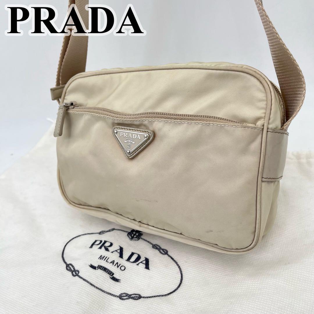 プラダ ショルダーバッグ カメラバッグ 斜めがけ 三角ロゴ ナイロン 男女可能 ☆PRADA☆ 三角ロゴ ポケット カメラバッグ ☆正規品☆ (PRADA