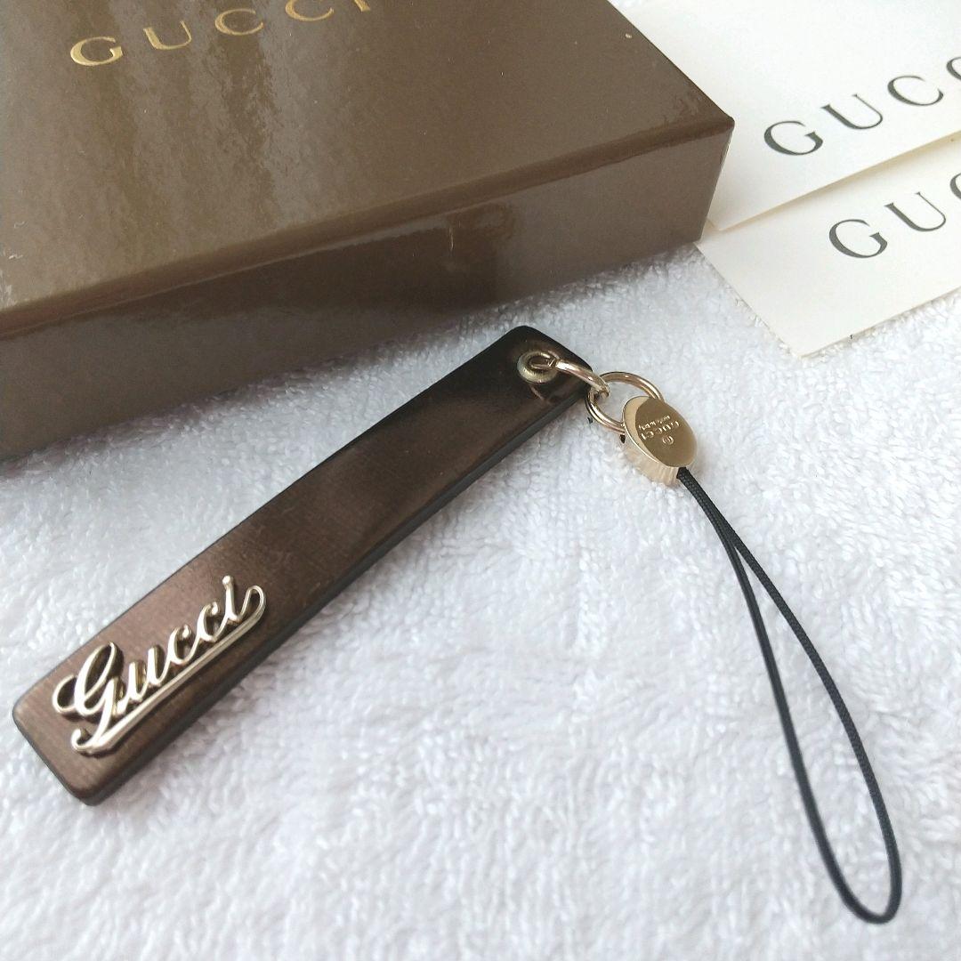 【新品 】 グッチ ストラップ GUCCI 筆記体ロゴ レザー 廃盤 ゴールド GUCCIグッチ 筆記体ゴールドロゴプレート長財布 レザー｜Yahoo!フリマ