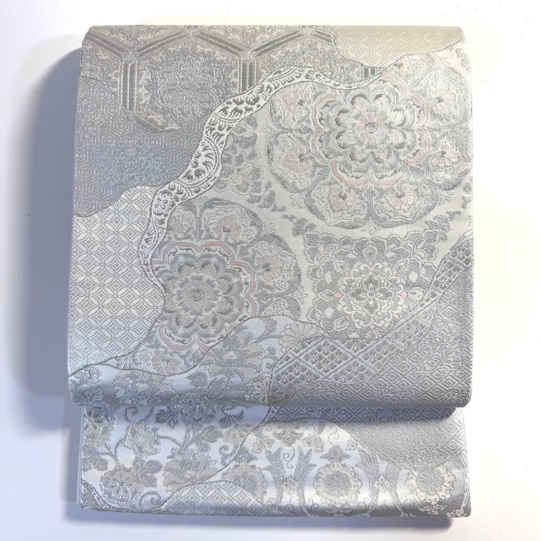 5k2789 袋帯 絹 西陣織 正倉院文様 華文 銀色 白 ピンク グレー 花柄