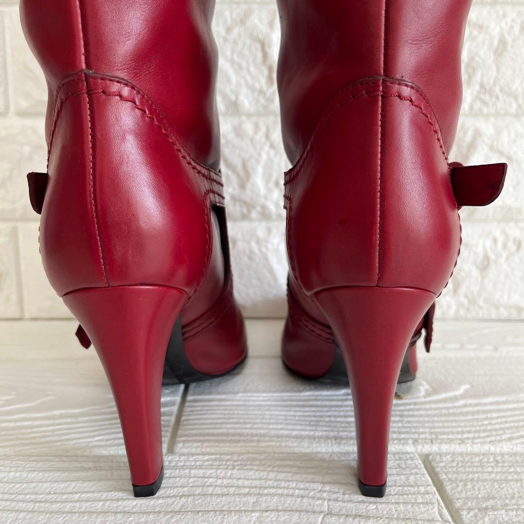 極美品】Sergio rossiレッド 本革ロング ブーツ 22.5ベルト装飾 - メルカリ