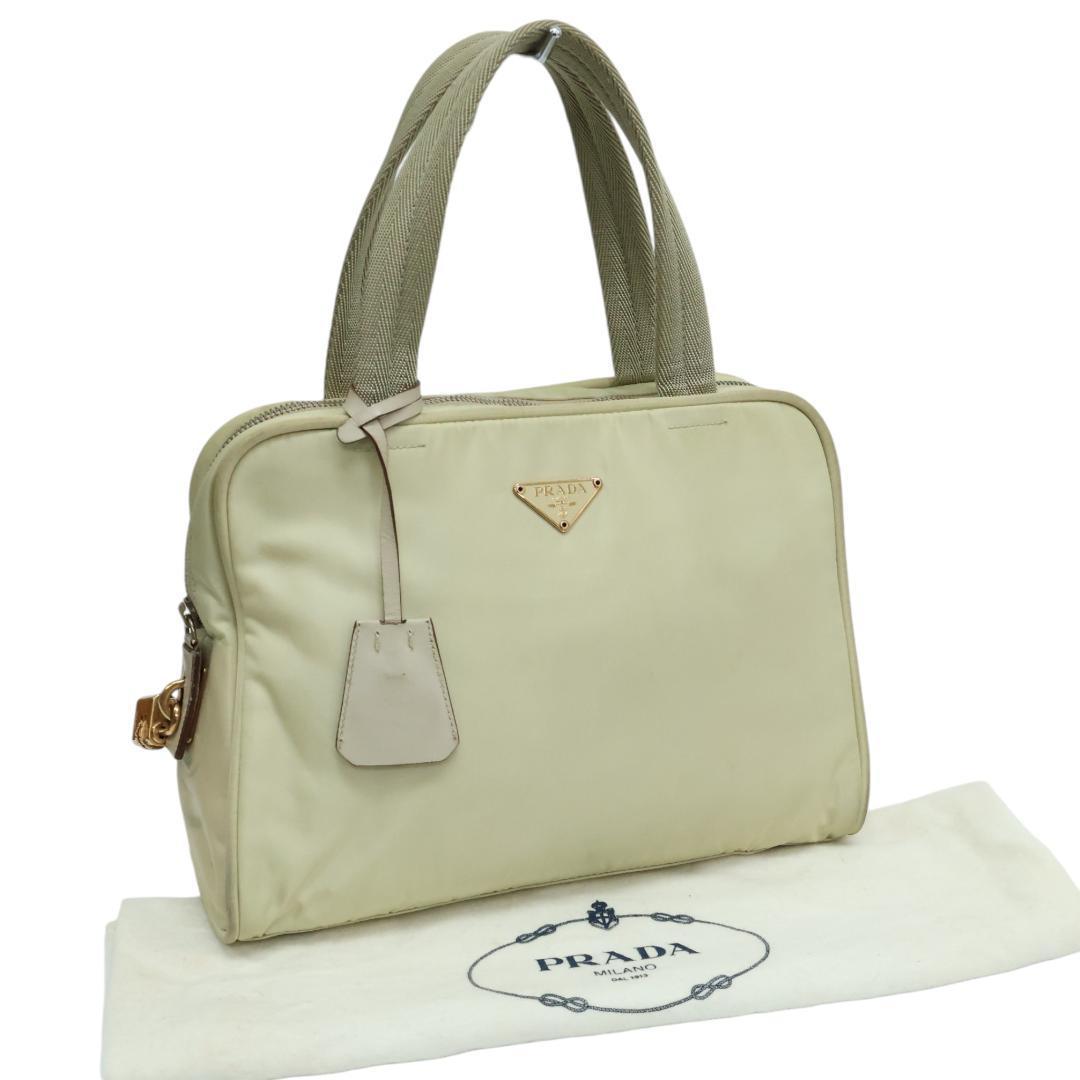良品 PRADA プラダ ハンドバッグ 三角ロゴ 白タグ ナイロン 正規品 楽天市場】【中古】良品 PRADA プラダ ナイロン 三角ロゴ プレート